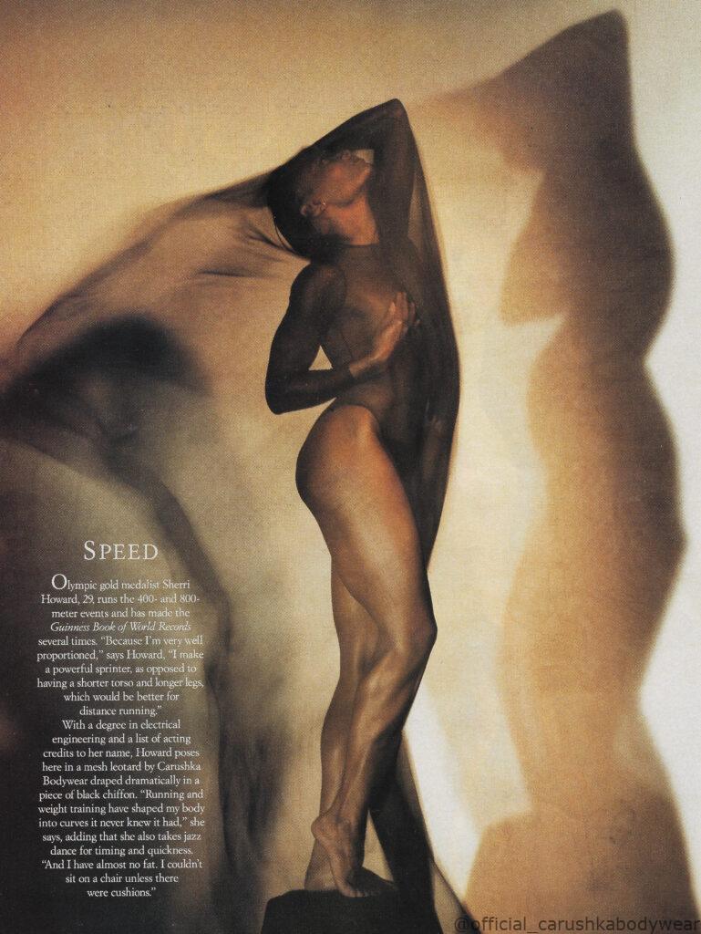 Olympic gold medalist Sherri Howard wearing a Carushka sheer mitered stripe leotard. This high-fashion athletic shot showcases the bold, transparent design elements that defined Carushka’s elite bodywear.