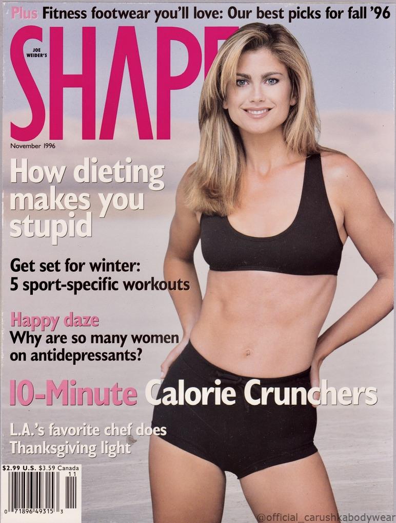 Famed Sports Illustrated swimsuit model, Kathy Ireland, on the Cover of Shape Magazine November issue 1996. Kathy Ireland is shown on the cover wearing Carushka Bodywear black betty sports bra and black tie waistband micro shorts.