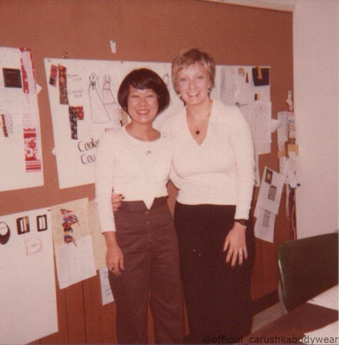 Carushka Jarecka working for Torri Richards in Hawaii seen in from of her designs with assistant.